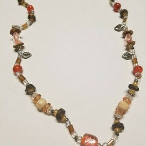 Seed beads and glass seed beads with silver leafs